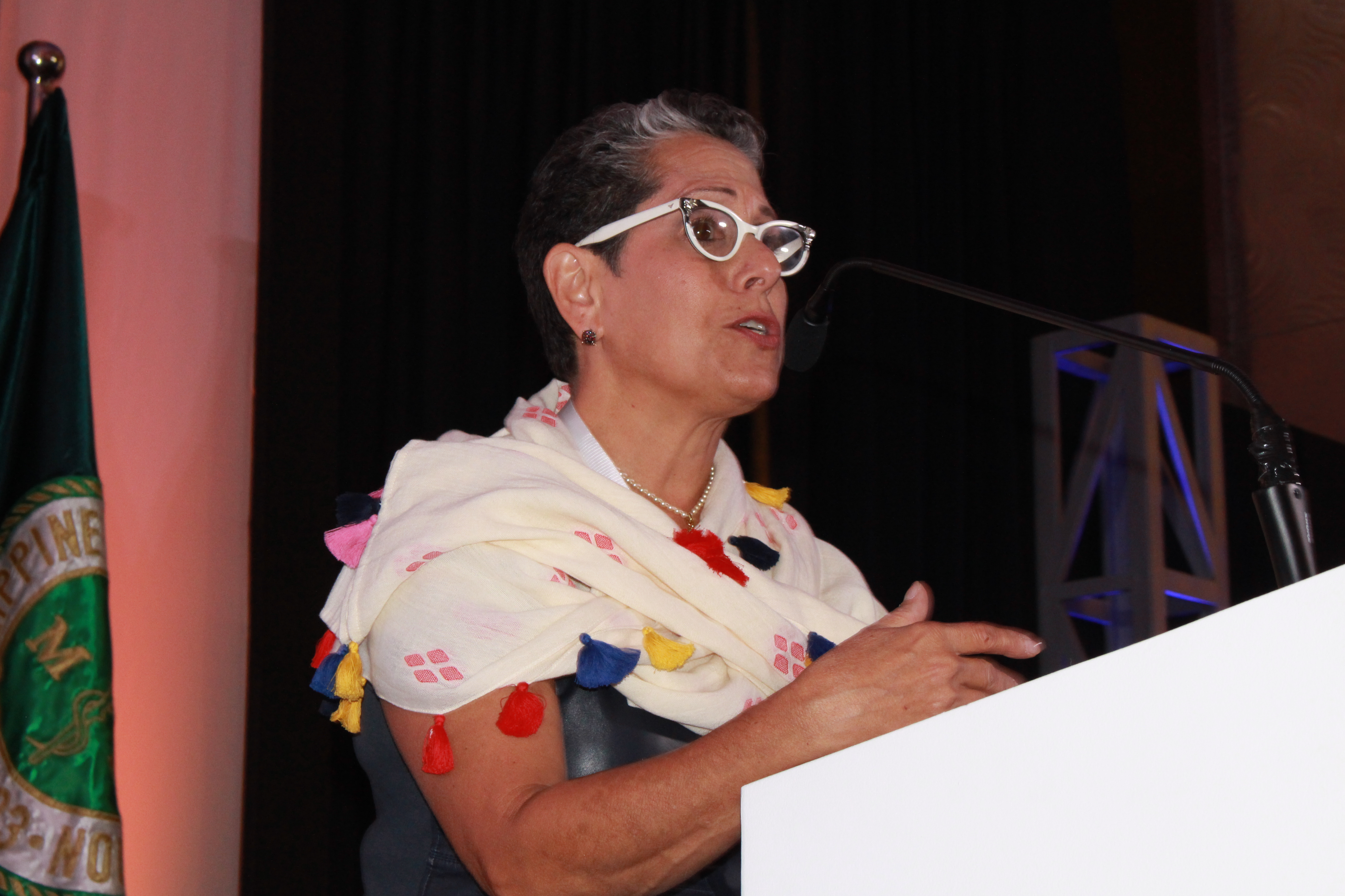 Close-up of a speaker delivering a lecture